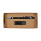 A cardboard box containing a black pen with silver accents and a black USB flash drive. The items are neatly arranged within individual compartments.