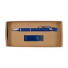 A brown cardboard box contains a blue pen and a blue USB flash drive. The pen has silver details, and the USB drive features a swivel cover.