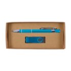 A cardboard box containing a blue pen with silver accents and a blue USB flash drive positioned below it. The interior of the box is plain cardboard, and the items are neatly arranged.