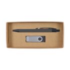 A brown cardboard box containing a black pen and a gray USB flash drive with a swivel cover. The pen and USB are neatly arranged parallel to each other inside the box.
