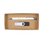 A rectangular cardboard box containing a white and silver pen placed above a black and silver USB flash drive. The box is open and shows both items neatly arranged.