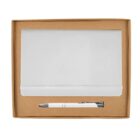 An open brown cardboard box containing a closed white notebook with an elastic band and a matching white pen with a silver clip.