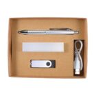 A brown cardboard box containing a metallic pen, a rectangular white item, a black and white USB flash drive, and a white USB cable on a white background.