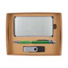 A gift set in a cardboard box containing a silver business card holder, a green and silver pen, and a silver USB flash drive.