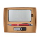 A cardboard gift box containing a silver metal card holder, a red pen with silver accents, and a silver and black USB flash drive.