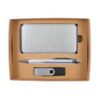 A brown box containing a silver business card holder, a silver and black pen, and a silver and black USB flash drive, all neatly arranged on a white background.
