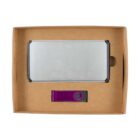 A rectangular cardboard box containing a silver metallic item on the left and a purple USB flash drive on the right. The box has a minimalist design with cutouts for the items inside.