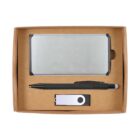A rectangular cardboard box containing a sleek silver power bank, a black pen with a stylus tip, and a swivel-style USB flash drive.
