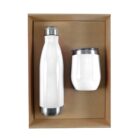 A set includes a white stainless steel water bottle with a silver cap and a white insulated tumbler with a transparent lid, both placed in a brown box.