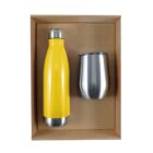 A gift box containing a yellow insulated water bottle and a stainless steel tumbler with a transparent lid, both placed side by side against a cardboard background.