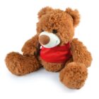 A fluffy brown teddy bear wearing a red vest sits upright. It has a soft, round face with a light brown snout and dark eyes. The bears arms and legs are outstretched, giving it a cuddly appearance.