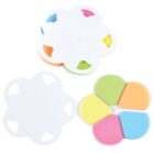 A flower-shaped highlighter set, opened to reveal five colors: orange, green, yellow, pink, and blue. The lid is partially shown, displaying cutout shapes matching the highlighter colors.