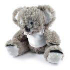 A fluffy gray koala plush toy wearing a white shirt. The toy has large round ears, a black nose, and black and gray details on its feet. It is sitting upright against a white background.