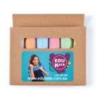 A cardboard box containing colorful chalk sticks is displayed. The box features a label with a girl in denim overalls, smiling and holding a braid. The label reads EDUKATE and includes a phone number and website address.