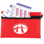 A red zippered pouch with Hamilton Health Services logo in white, containing several adhesive bandages sticking out from the top.