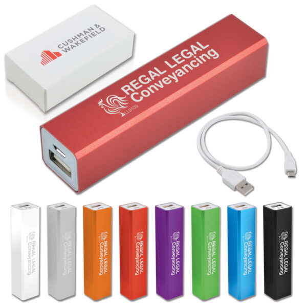 A collection of portable power banks in various colors: red, black, blue, purple, green, orange, silver, and white. Each is branded with a logo. A white USB cable and branded rectangular box are included.