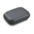 A compact, dark gray hard-shell case with a zipper, closed and resting on a white background. The case is rectangular with slightly rounded edges, designed for storing small items or electronics securely.