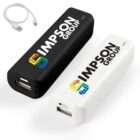 Two portable power banks, one black and one white, each with Impson Group logo. They have a USB port and a micro USB input. A short white USB cable is included.