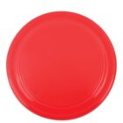 A bright red frisbee with a smooth surface and a slightly raised edge is shown against a plain white background.