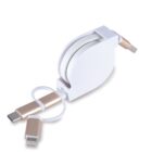 A retractable charging cable with gold-toned connectors, featuring USB-C and Lightning tips. The white casing houses the coiled cable, designed for portable use.