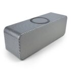 A rectangular wireless speaker with a textured, checkered design. It has a circular control panel on top and a mesh-covered front. The speaker is positioned at a slight angle on a plain background.
