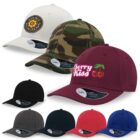 A collection of seven baseball caps in different colors and designs, including white with a floral logo, camouflage, burgundy with Cherry Kiss and cherries, black, dark gray, red, and blue.