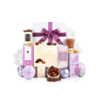 Choco Loco Lovers Gift Set with popcorn, purple ribbon, ornaments, and snowflakes.