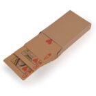 Set of playing cards in a box, showing queen, king, ace of hearts.