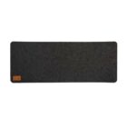 Dark gray rectangular felt mat with a small brown label in the corner.