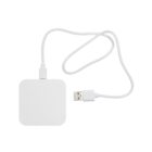 White square USB charger with attached cable on a white background.