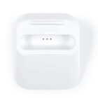 White charging dock with a slot and three small indicator lights.