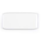 White rectangular bar of soap on a plain background.