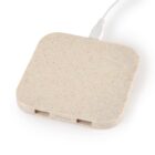 Square beige charging pad with an attached white cable.