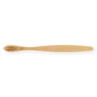 Bamboo toothbrush with beige bristles on a white background.