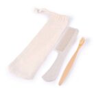 Wooden toothbrush, beige comb, and cloth pouch on a white background.