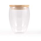 Glass container with a wooden lid, viewed against a white background.