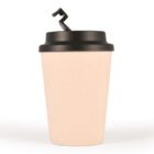 Beige reusable cup with a black lid and curly straw on a white background.
