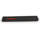 A red pen partially inside a long black box.