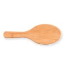 Wooden oval paddle with handle, isolated on white background.