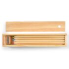 Wooden box with colored pencils, sharpener, and sliding lid.