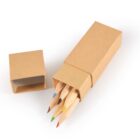 Box of five colored pencils partially open, revealing the pencil tips.