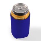A can in a blue neoprene cooler sleeve.
