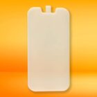 White smartphone-shaped object against a bright orange background.