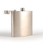 Stainless steel hip flask with open screw cap, standing upright on a flat surface.