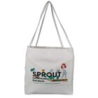 White tote bag with Sprout Community Gardens logo featuring a woman with plants and text Planting Roots, Nurturing Community.