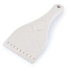 A beige plastic ice scraper with a hole for hanging.