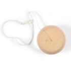 Wooden yo-yo with a white string, viewed from above on a white background.