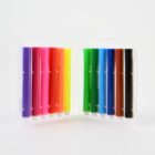 A set of colorful markers in a plastic case, featuring a range of hues from purple to black.