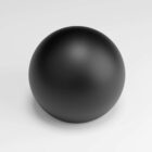 A smooth, black, matte sphere sits on a white surface with soft shadows.