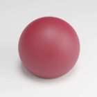 Red sphere on a white surface, evenly lit, displaying a smooth texture.